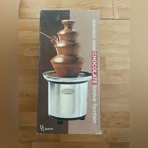 Stainless steel chocolate fountain.  New in box. Never used.
